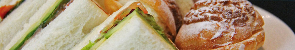 Eating Sandwich at Creme Si Bon restaurant in San Ramon, CA.